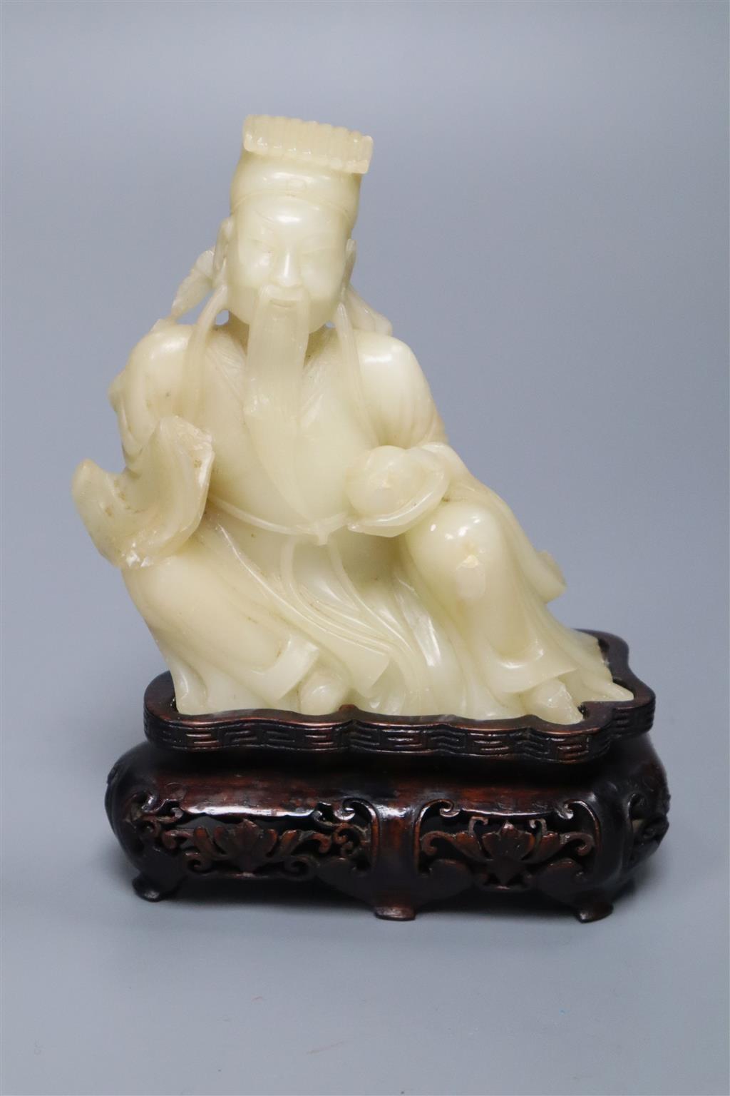 A Chinese soapstone figure of a Star God, wood stand, overall height 14cm
